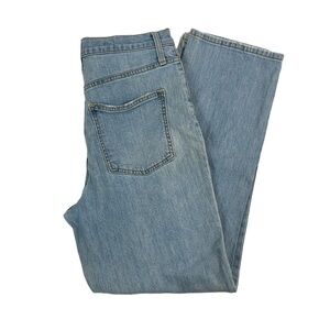 Destressed button fly light wash jeans